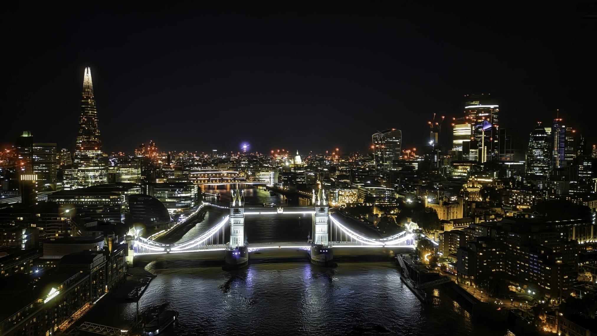 vecteezy-scenic-aerial-view-of-the-tower-bridge-and-city-at-night-in-39640071-2-small