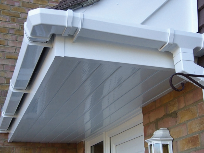 sutton-porch-with-white-upvc-fascias-cladding-gutter-drainpipe-detail-1030x772-small